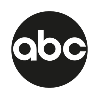 Black circle with 'abc' logo in white on a white background