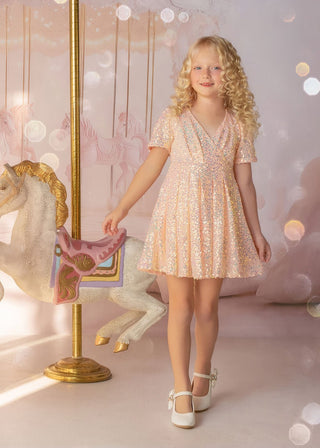 Faeella shine like a star is a Iridescent peach sequin birthday dress for girls. Perfect for flower girl and wedding event.