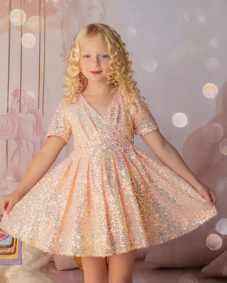 Faeella shine like a star is a Iridescent peach sequin birthday dress for girls. Perfect for flower girl and wedding event.