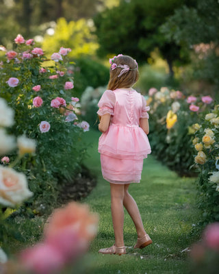Blush Petal Princess Ruffle Pink Birthday Dress for Girls — styled photo of blush pink ruffle girls birthday dress by Faeella