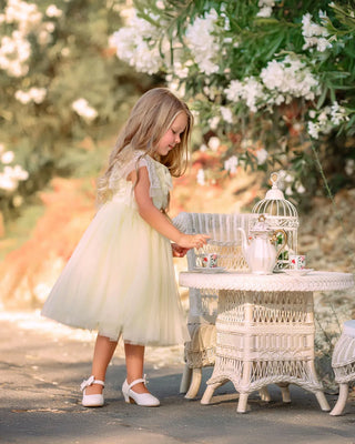 Buttercream Belle Pearl Capelet Flower Girl Dress lifestyle photo flower girl dress by Faeella