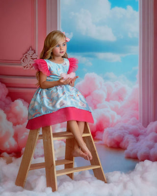 Cloud-print rainbow party dress for toddler girl. Perfect Faeella dress for everyday play.