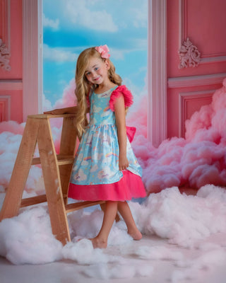 Cloud-print rainbow party dress for toddler girl. Perfect Faeella dress for everyday play.