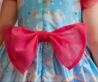 Cloud-print rainbow party dress for toddler girl. Perfect Faeella dress for everyday play.