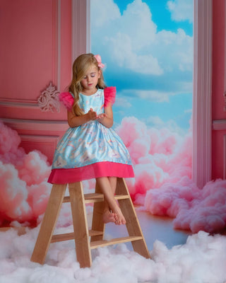 Cloud-print rainbow party dress for toddler girl. Perfect Faeella dress for everyday play.