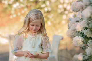 Enchanted Bloom Embroidered Ivory Flower Girl Dress — styled photo of ivory embroidered tulle flower girl dress by Faeella