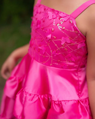 Faeella Wildflower Cowgirl Ruffle Dress Close-up of sequin butterfly bodice on hot pink Faeella dress. Comfortable yet fancy dress perfect for photoshoots, events and outdoor party.